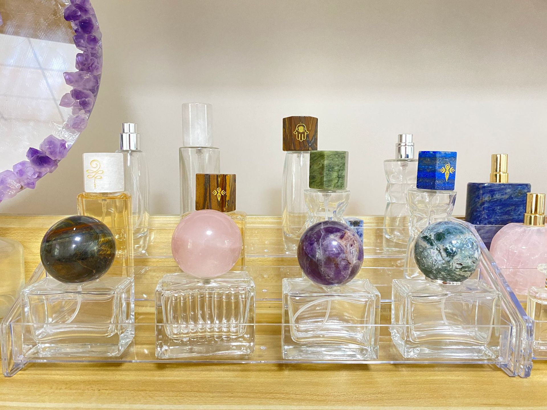 Raw stone pink crystal / amethyst spherical cap for perfume and aromatherapy bottles.